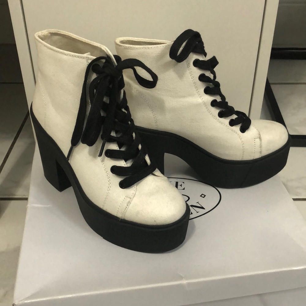 White chunky heeled boots, like Steve Madden or Doc martins